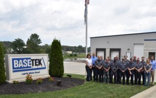 Company Picture in front of White Road Building