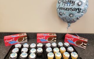 10 years of manufacturing at BaseTek celebrating with cupcakes and icecream