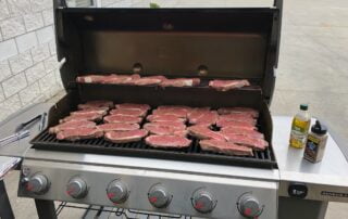 Grill filled with great looking thick steaks