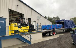 Loading 20,000 lb castings with tow motor