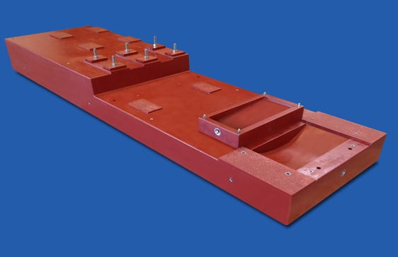 Custom Novolac pump base with ground polymer pads and multiple level mounting surfaces
